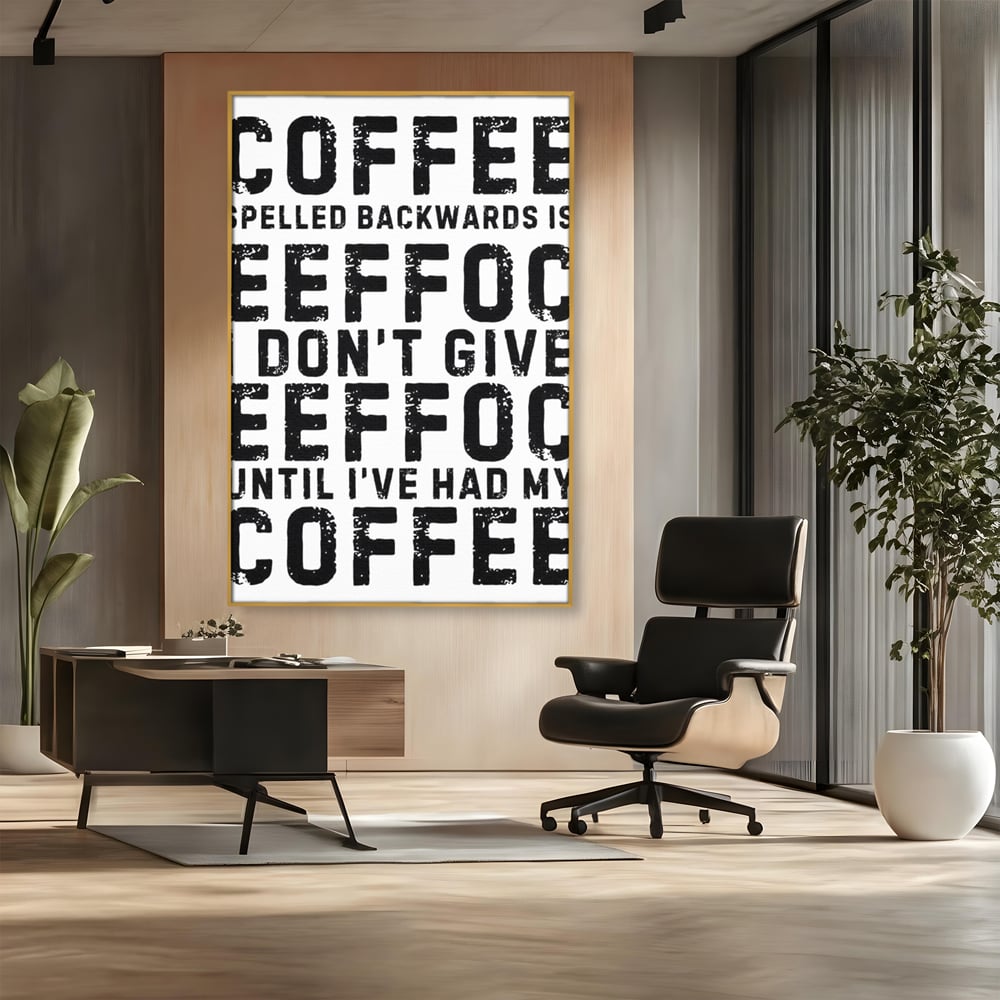 Tablou canvas cu tablou canvas cu mesaj motivational despre cafea, in rama de aluminiu auriu, pe perete intr-un birou
